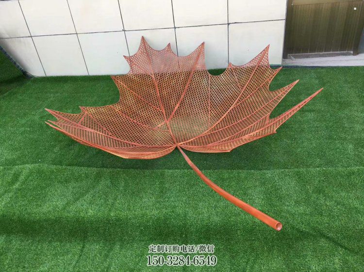 鏤空樹葉雕塑，景區(qū)雕塑，鐵藝樹葉雕塑廠家指用